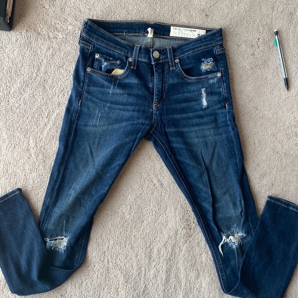 rag & bone blue distressed jeans.